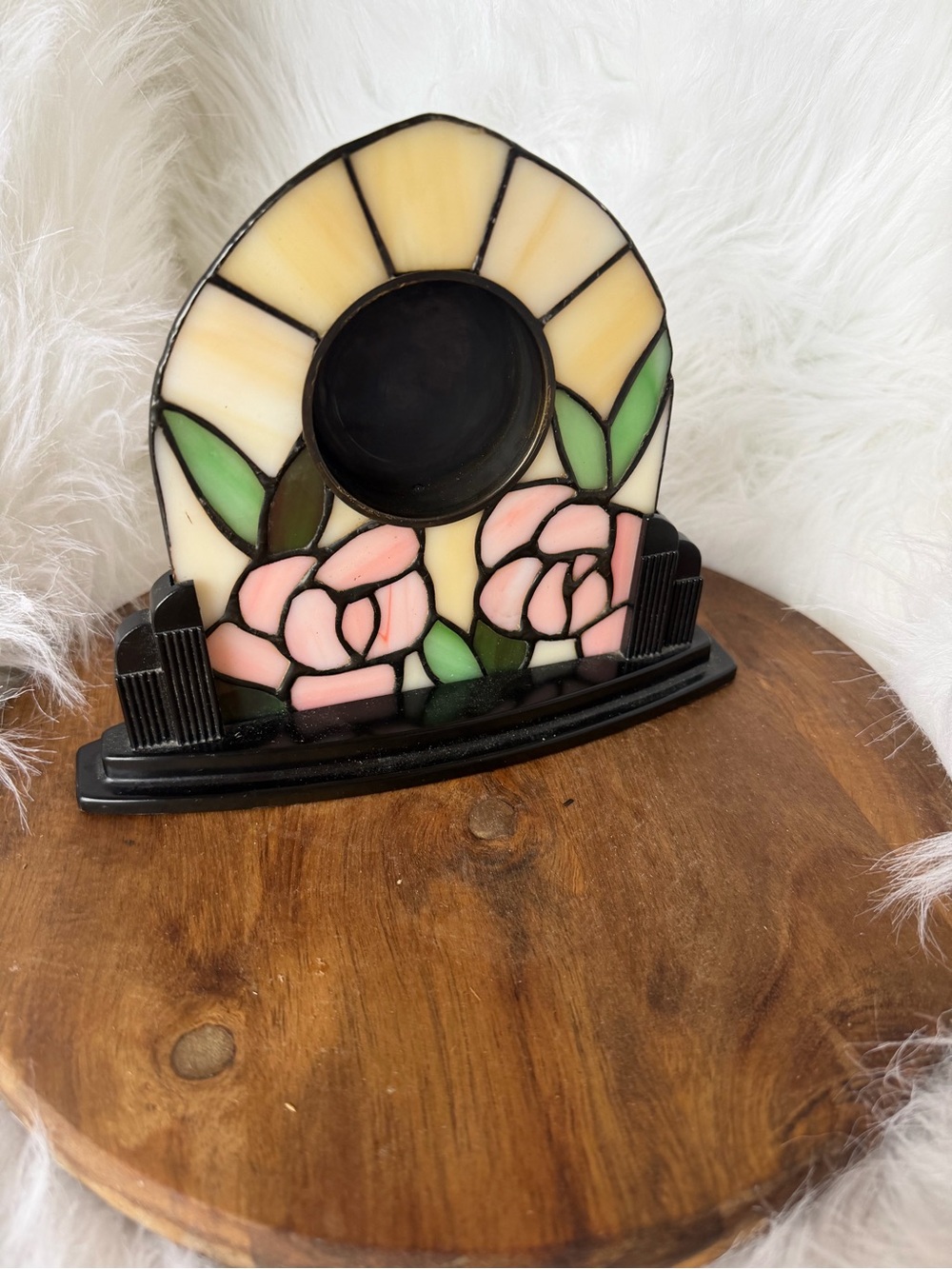 A Linden stained glass mantel clock with a rose motif.
